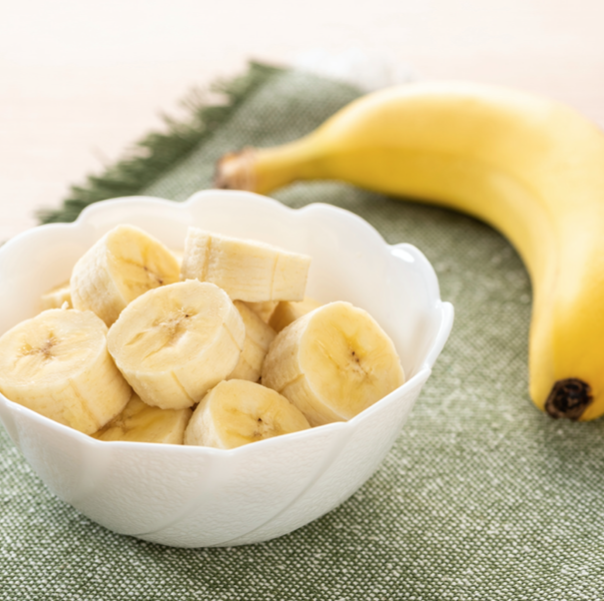 bowl of bananas with whole banana