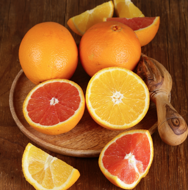 oranges on cutting board
