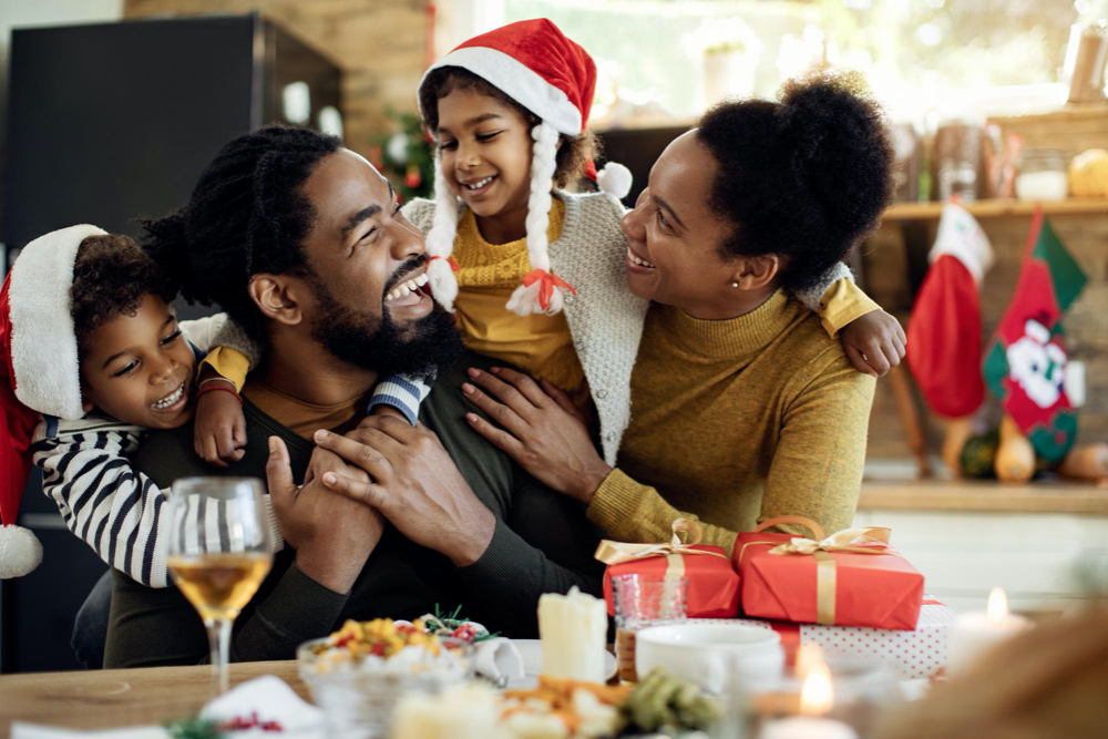 joyful family gathered around for Christmas morning