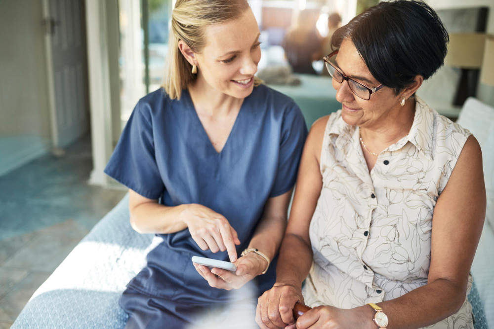 happy woman nurse and phone in elderly care for support consultation or healthcare diagnosis at hom