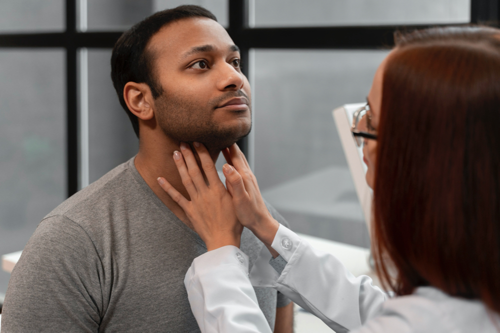 side view doctor checking patient
