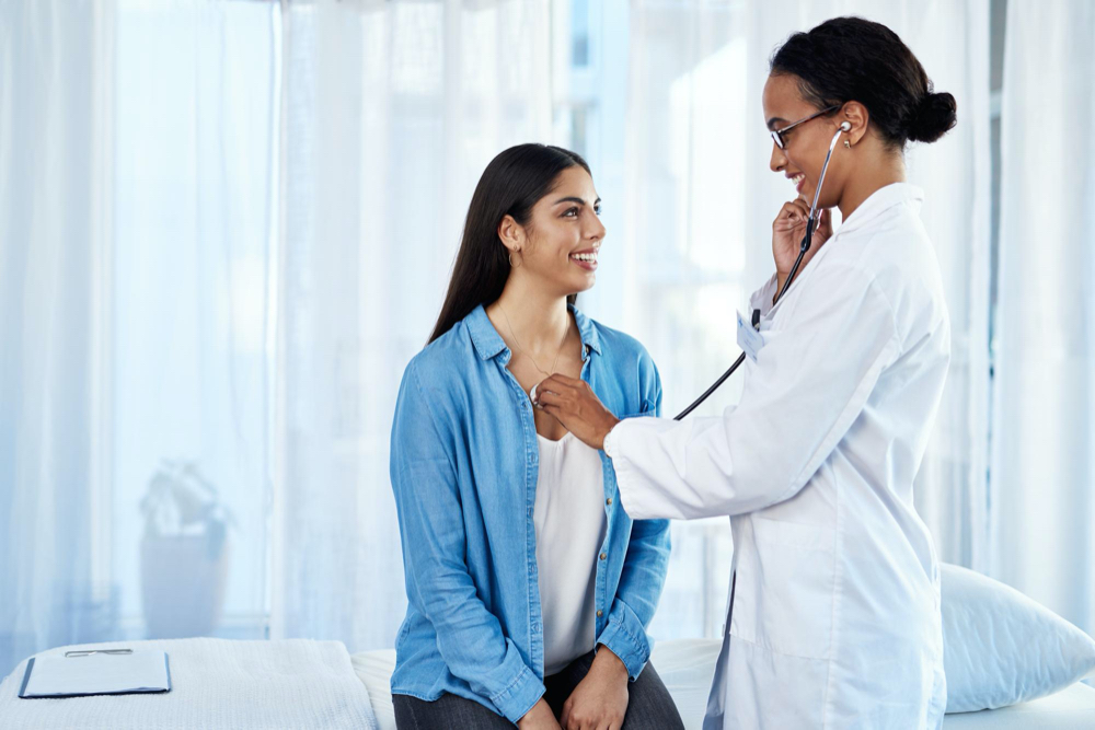 strong set of lungs you have there shot of a young doctor examining her patient with a stethoscope